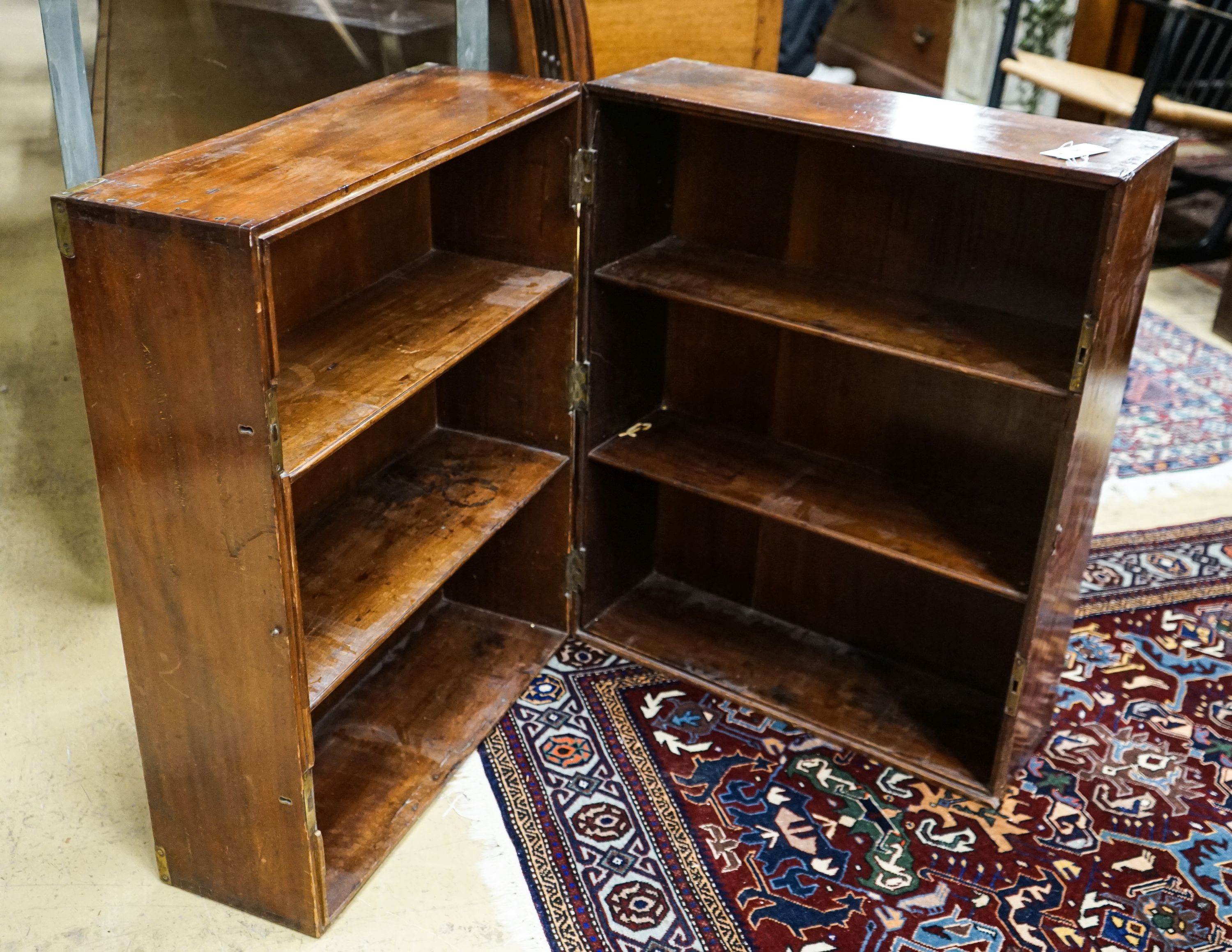 A 19th century brass mounted mahogany campaign trunk with shelved interior, length 60cm, depth 40cm, height 74cm